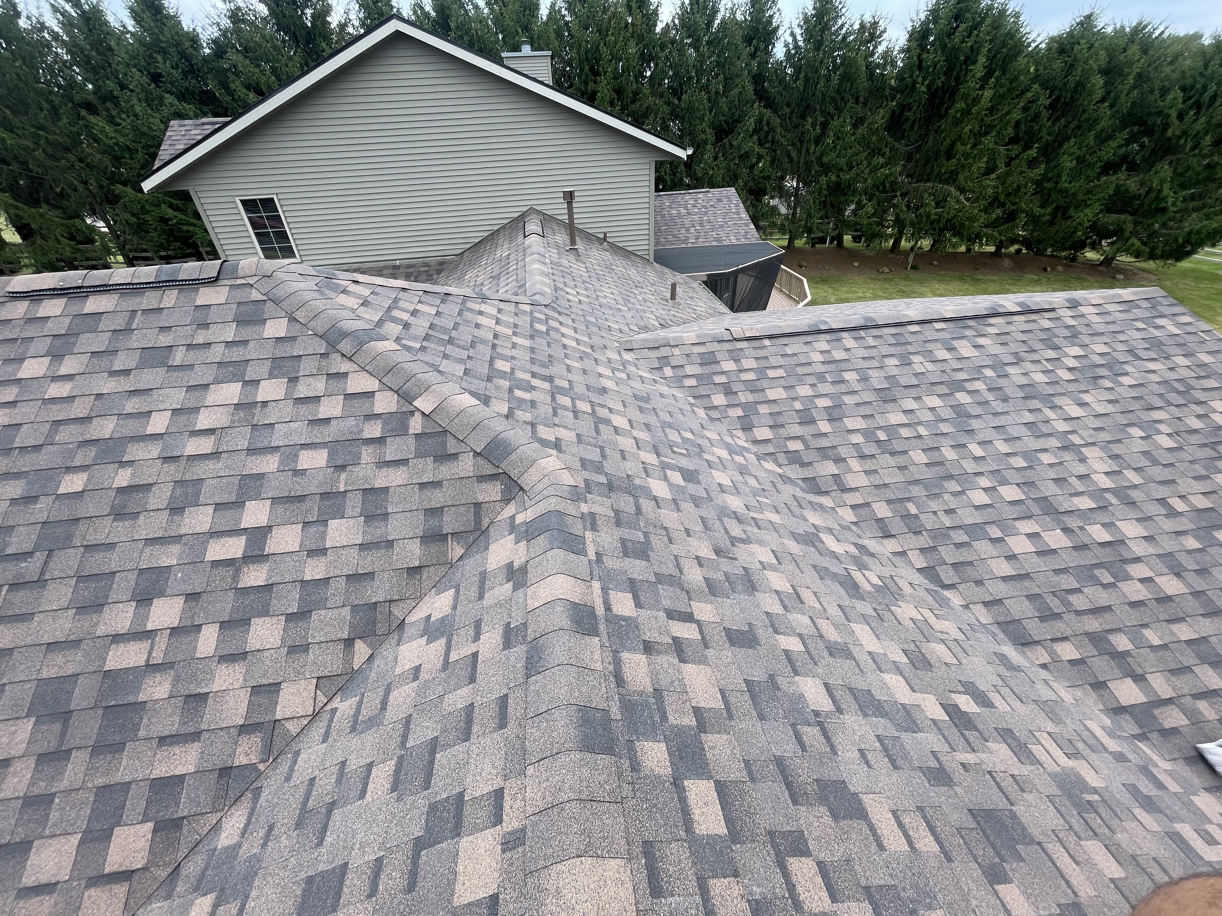 Aerial of a multi gable roof finished by Pixler