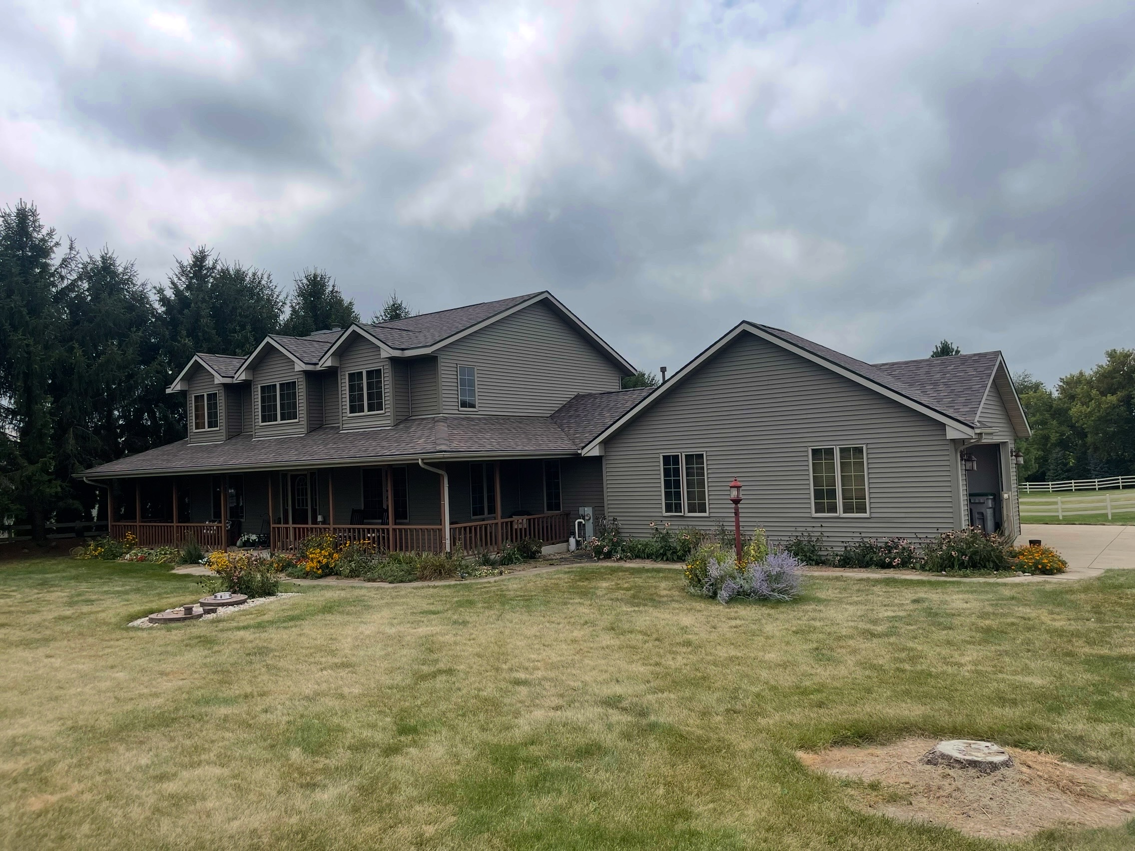 Same Wisconsin home after Pixler storm restoration, overcast day