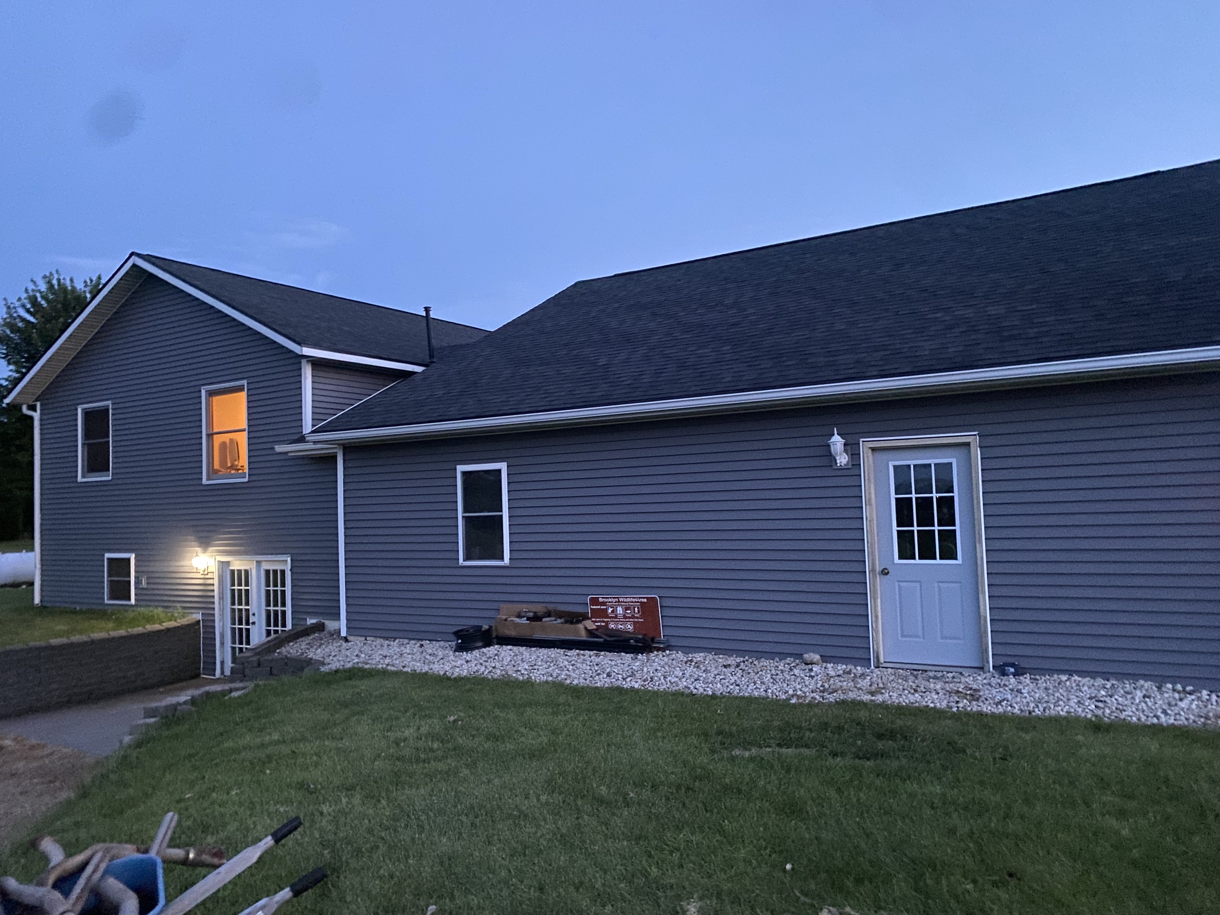 Newly sided Wisconsin home photographed at dusk