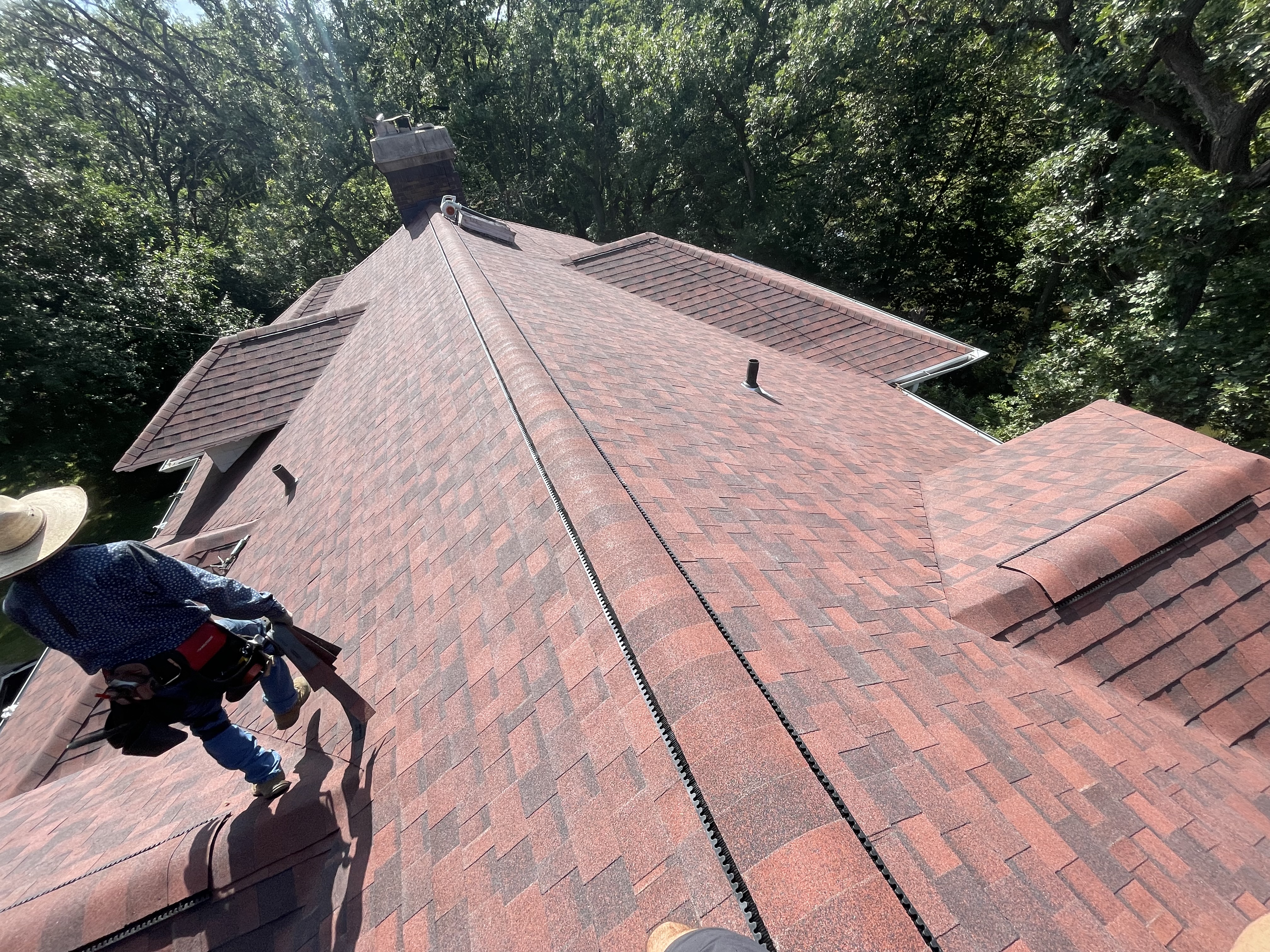 Pixler roofer on a new shingle install
